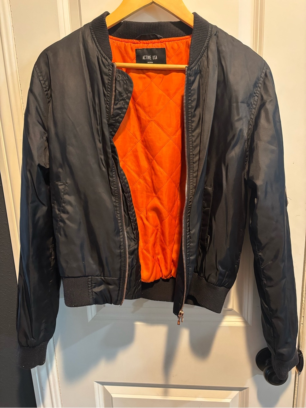 Active USA Black Bomber Jacket with Orange Quilted Interior